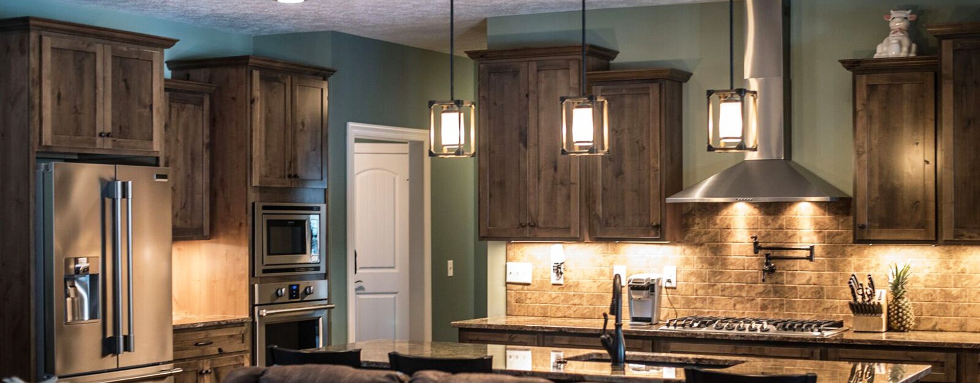 darker_toned_kitchen_with_island