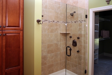 bathroom shower closeup leading to walking closet