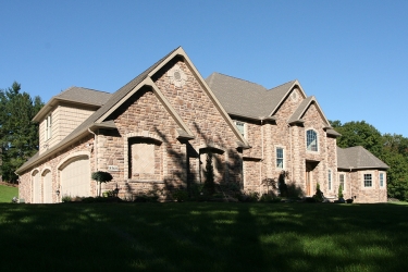 custom stone home by gatliff custom homes