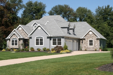 gray stone custom home by gatliff custom builders