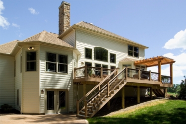 large rear deck with pergola by gatliff custom builders