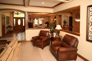 living room view to foyer and dining room