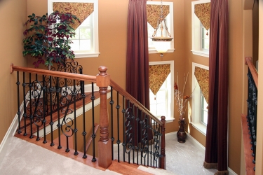 luxurious stairway with lots of natural light