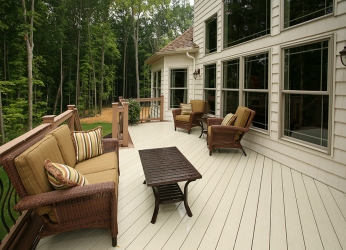 rear deck overlooking wooded area