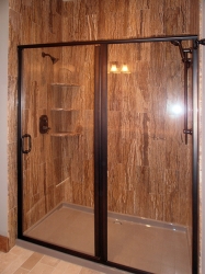 shower with wood-grain tile walls