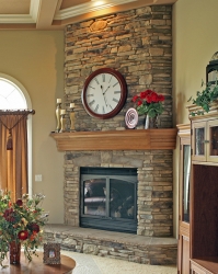 stone fireplace with custom hardwood mantel